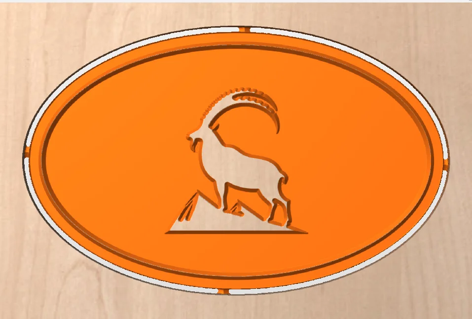 CAM-Ansicht mit den orange dargestellten Werkzeugwegen für Steinbockmotiv und ovale Umrandung
